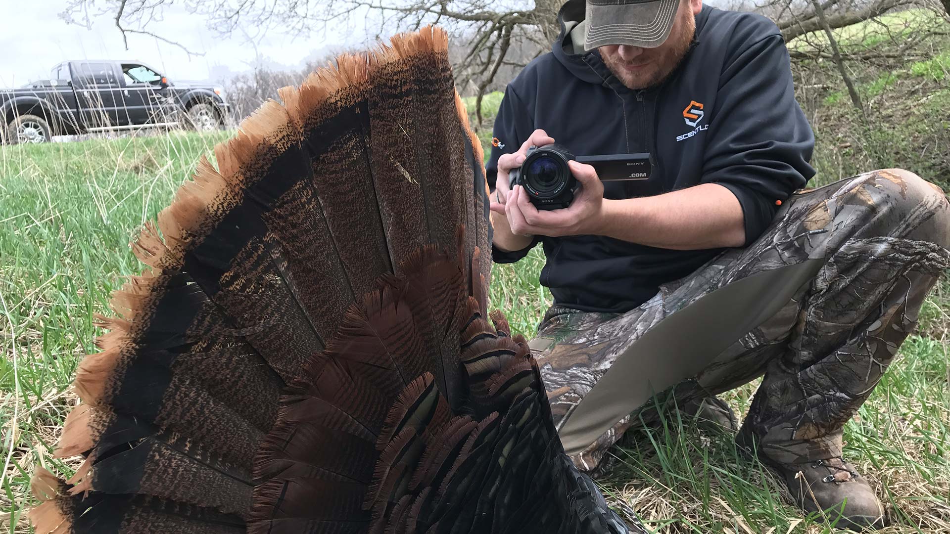 Hunter filming turkey